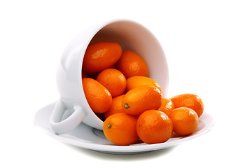 Image showing Kumquats in a white cup.