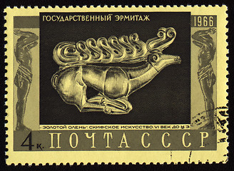 Image showing Image of golden deer on post stamp