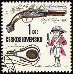 Image showing Ancient pistol on post stamp