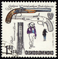 Image showing Ancient pistol on post stamp