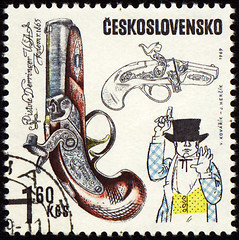 Image showing Ancient pistol on post stamp