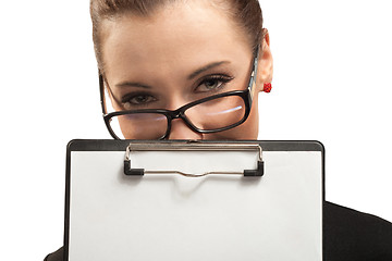 Image showing Business woman with clipboard isolated on white