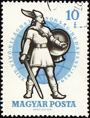 Image showing Ancient warrior with sword on post stamp