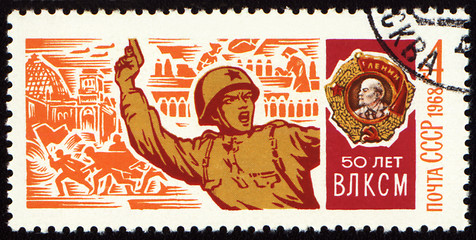 Image showing Soviet officer with a pistol in battle on postage stamp