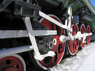 Image showing Red wheels of old russian  locomotive