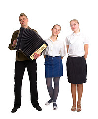 Image showing A soldier and two girls sing a song