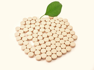 Image showing Pills medicine in shape apple with green leaf bio