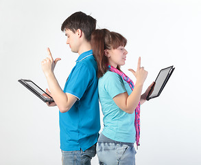 Image showing A young couple with a Tablet PC