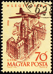 Image showing Flying plane over the Gyor on post stamp