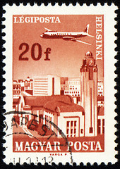 Image showing Flying plane above the Helsinki on post stamp