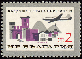 Image showing Flying plane over the Plovdiv town on post stamp