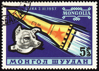 Image showing Soviet rocket and dog Laika on Mongolian post stamp