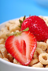 Image showing Bowl of oat cereal with strawberries