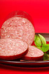 Image showing Cured salami with basil