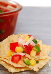 Image showing Tortilla chips with salsa