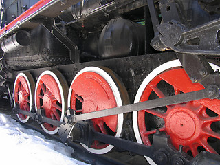 Image showing Red wheels of old russian  locomotive