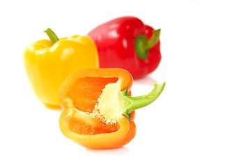 Image showing Orange, yellow and red bell peppers