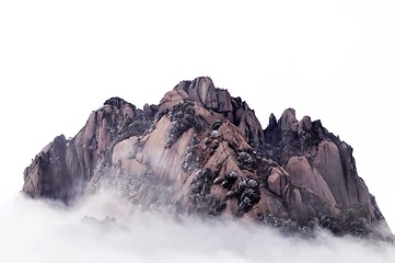 Image showing Rocky mountains in the morning fogs