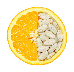 Image showing Close up of orange and pills isolated