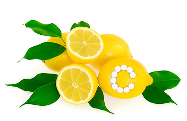 Image showing Lemons with vitamin c pills over white background 