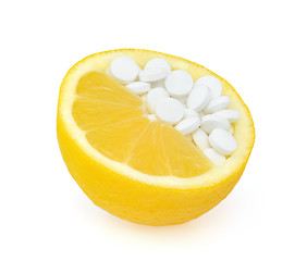 Image showing Close up of lemon and pills isolated 