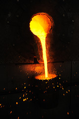 Image showing Foundry - molten metal poured from ladle for casting