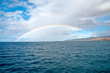 Image showing Kauai Island shore and the rainbow