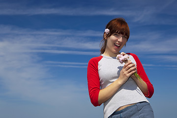 Image showing Woman with flowers