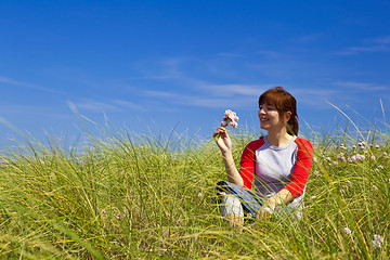 Image showing Woman with flowers