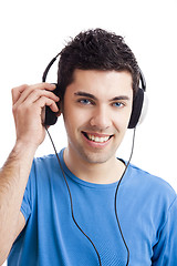 Image showing Young man listen music