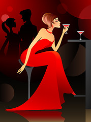 Image showing Woman having cocktail at the bar