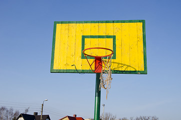 Image showing Basketball basket tattered bow mesh background sky 