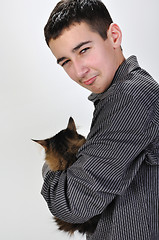 Image showing kid holding a cat