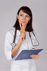 Image showing Female Doctor in Thoughtful Pose