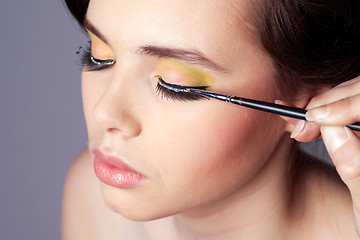 Image showing Applying Makeup