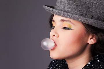 Image showing Girl Making a Bubble Portrait