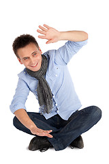 Image showing Cheerful Casual Man Sitting