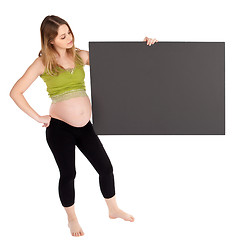 Image showing Pregnant Woman Holding Blank Board