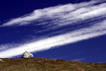 Image showing A rock and some clouds.