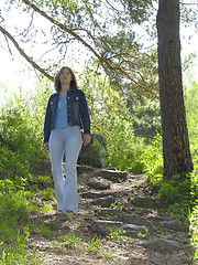 Image showing Girl on the path in the pine forest