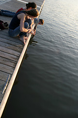 Image showing Teens on a Pier