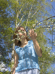 Image showing Girl and flowers