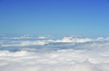 Image showing Above the clouds