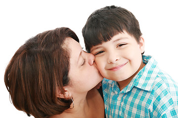 Image showing Adorable mother kissing her beautiful son isolated on white back