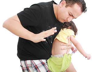 Image showing Angry father hitting her little baby daughter