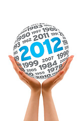 Image showing Hands holding a 2012 Sphere
