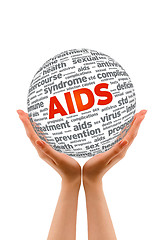 Image showing Hands holding a Aids 3D Sphere