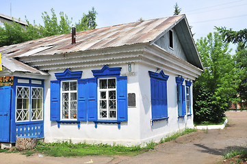 Image showing Russian rural house with carved windows