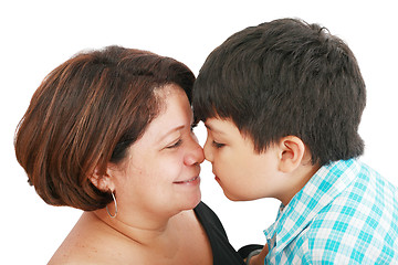 Image showing mother and son about to kiss - isolated over white 