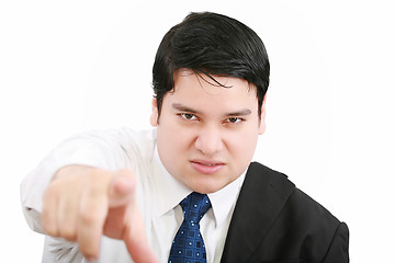 Image showing Portrait of an angry young business man in suit pointing at you 